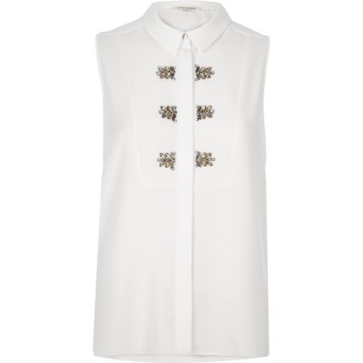 White embellished sleeveless blouse
